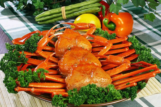 snow crabs with green leafy vegetables