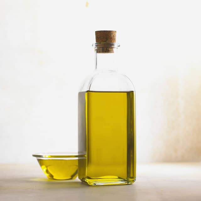 olive oil in glass bowl and flask